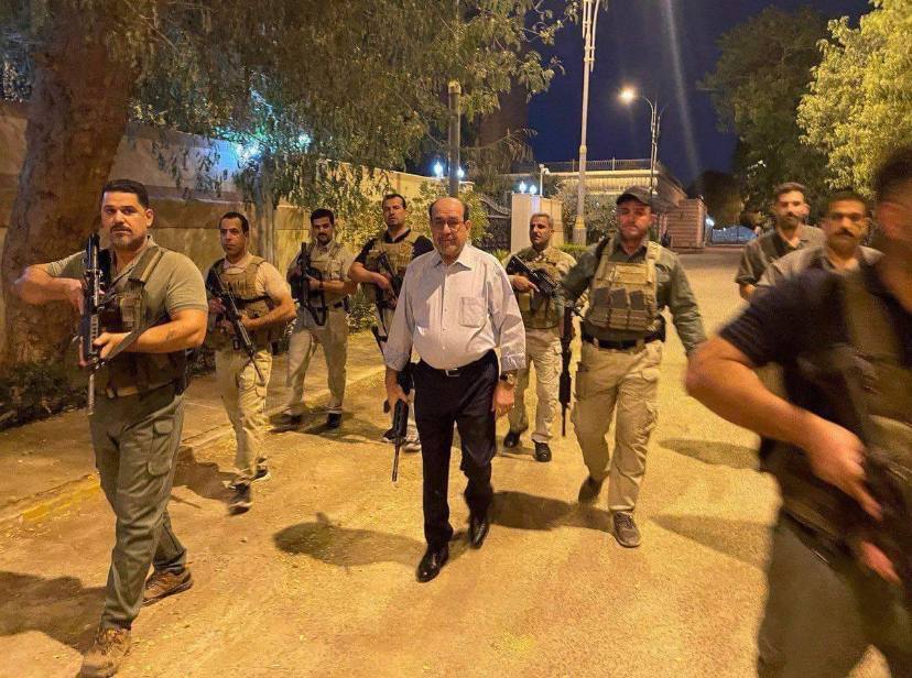 ماذا يجري في العراق؟! التيار الصدري يقتحم البرلمان والمالكي يحمل سلاحه أمام منزله